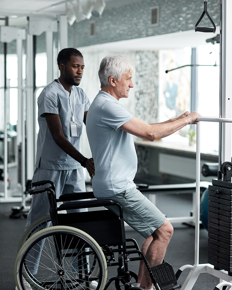 Senior Man doing Rehabilitation Exercises in Gym Skilled Nursing Facility Pleasanton
